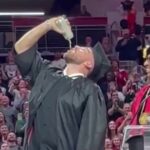 Travis Kelce’s brother defends him for chugging beer at graduation in support of Taylor Swift’s boyfriend.
