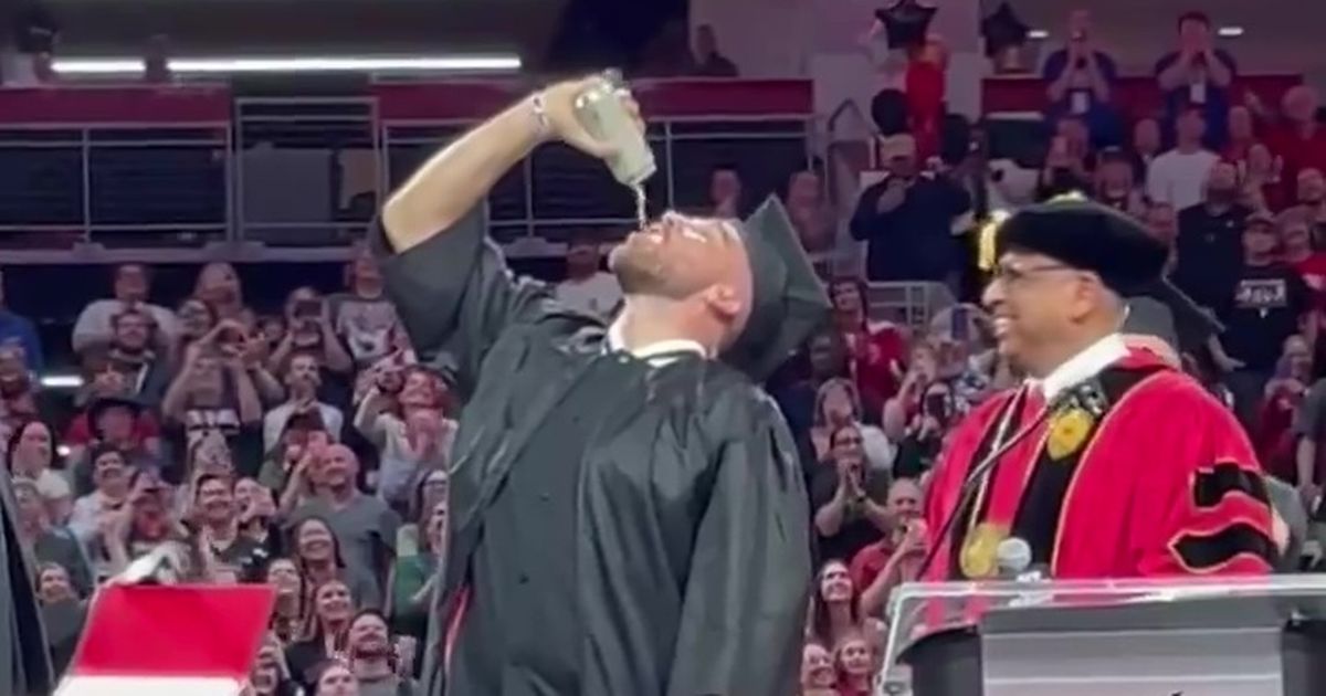 Travis Kelce’s brother defends him for chugging beer at graduation in support of Taylor Swift’s boyfriend.