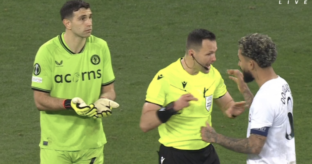 Emi Martinez receives second yellow during penalty shootout, but Villa goalkeeper not sent off.