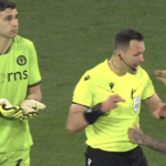 Emi Martinez receives second yellow during penalty shootout, but Villa goalkeeper not sent off.